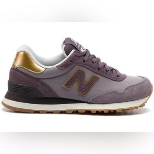 Women’s New Balance 515 sneakers in a grey/purple and gold colorway